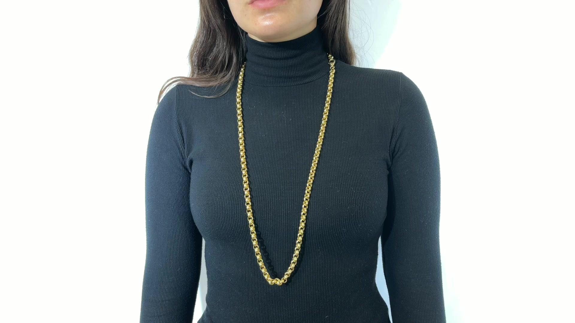 Long 36 Inch Interlocking 18 Karat Yellow Gold Link Necklace. 73.5 grams. Circa 1990s.

About The Piece: Trendy and universal, this unique interlocking chain will complete any outfit and compliment your moves on the dance floor. This shimmering