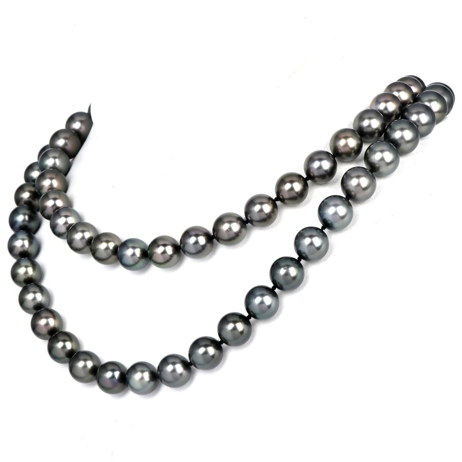 A Perfect 36-inch long strand of High lustrous Tahitian South Sea Pearls of 13 to 10 mm, Hardly with any blemishes. A multicolor dance of black, Dark Gray, and peacock Genuine pearls makes this necklace a unique match of beauty and glamour.

The