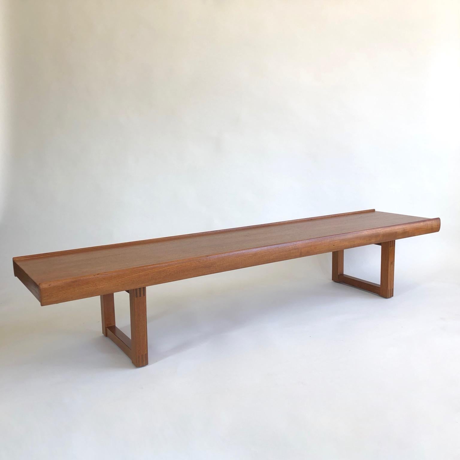 183cm (72inches) long Scandinavian midcentury teak bench or coffee table. This model is heavy, solid and superb quality (see images showing the carpentry joints).