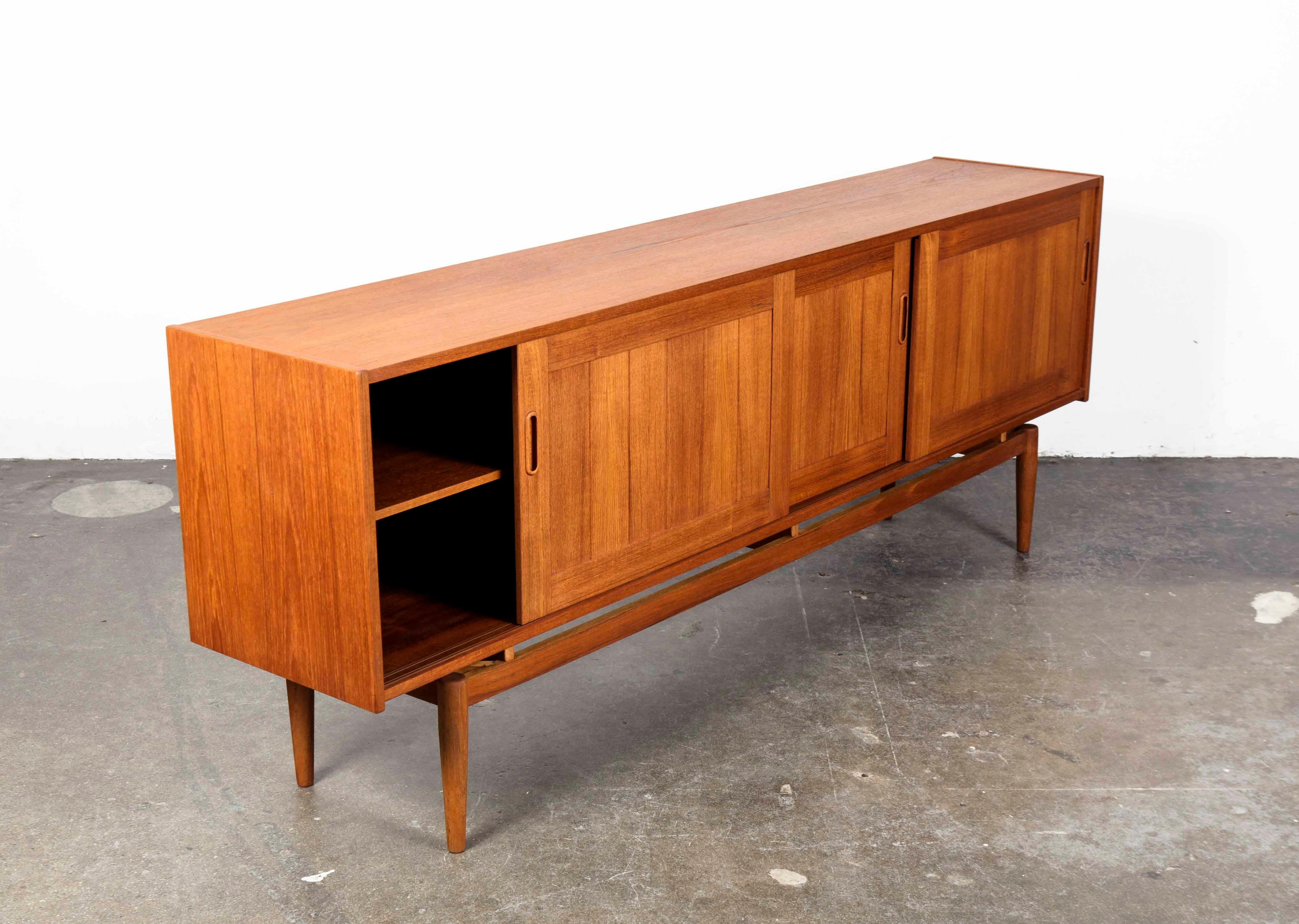 Mid-Century Modern Long and Low Swedish Teak Panel Front Sideboard with 3 Sliding Doors