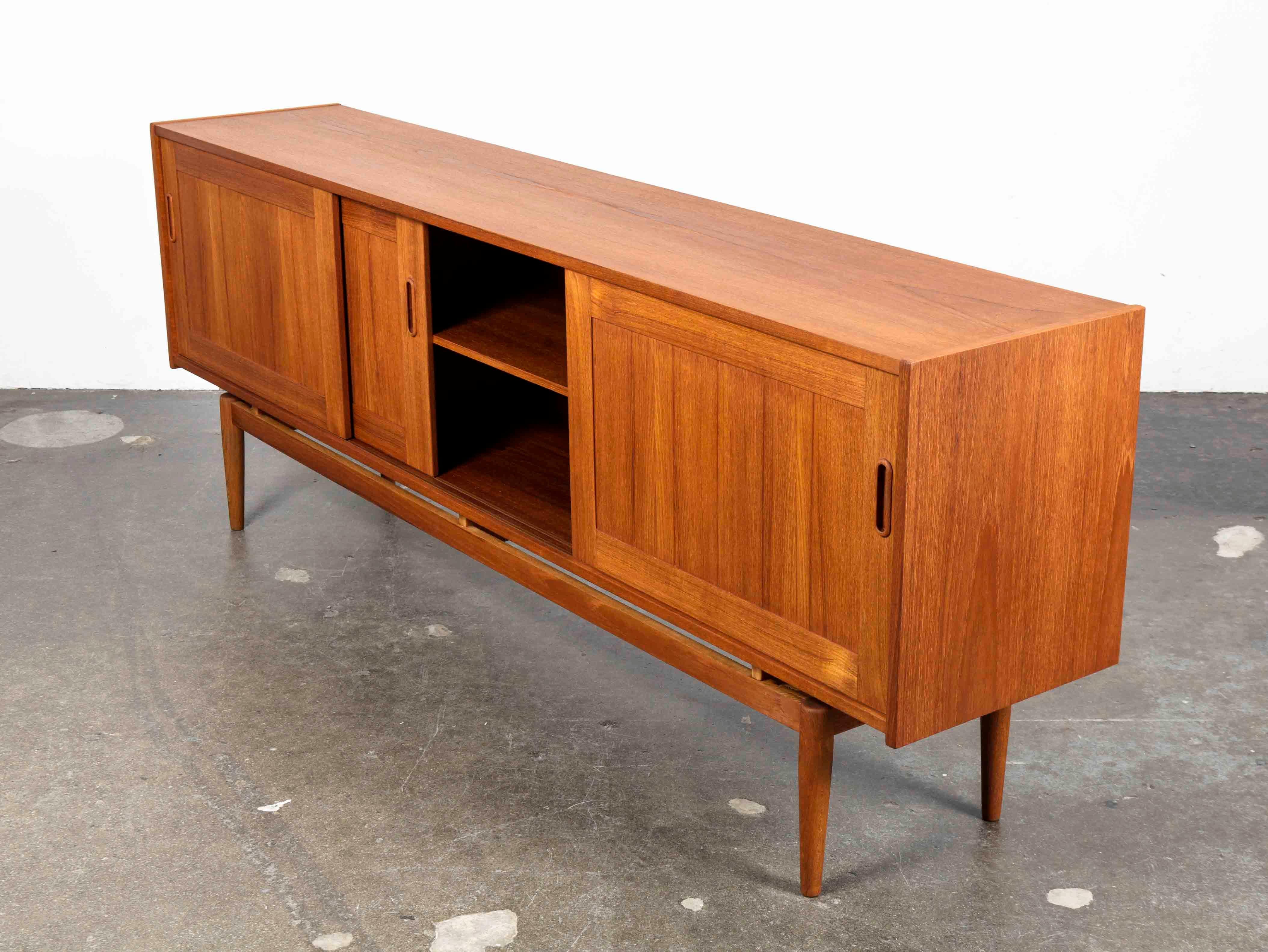 Long and Low Swedish Teak Panel Front Sideboard with 3 Sliding Doors 2