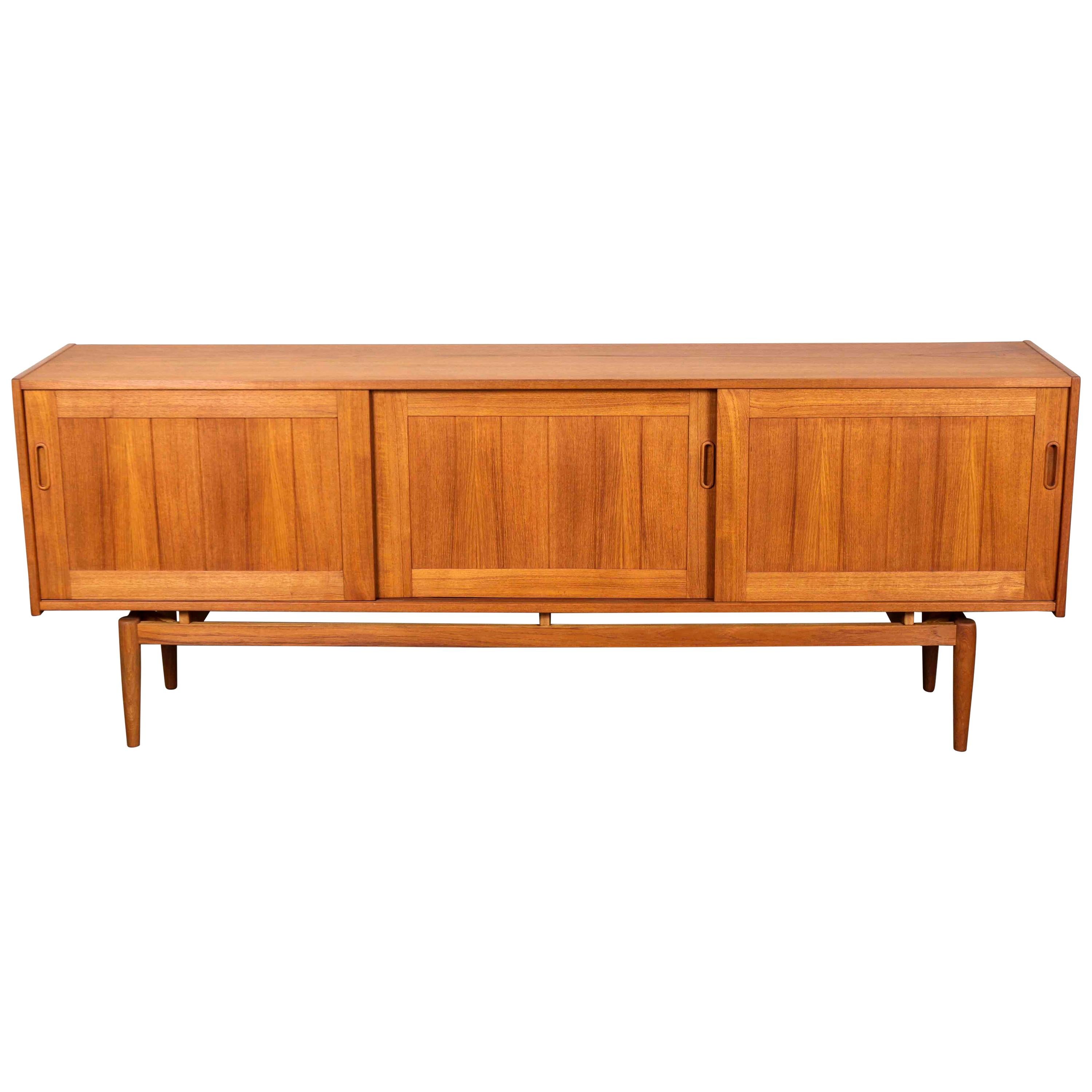 Long and Low Swedish Teak Panel Front Sideboard with 3 Sliding Doors