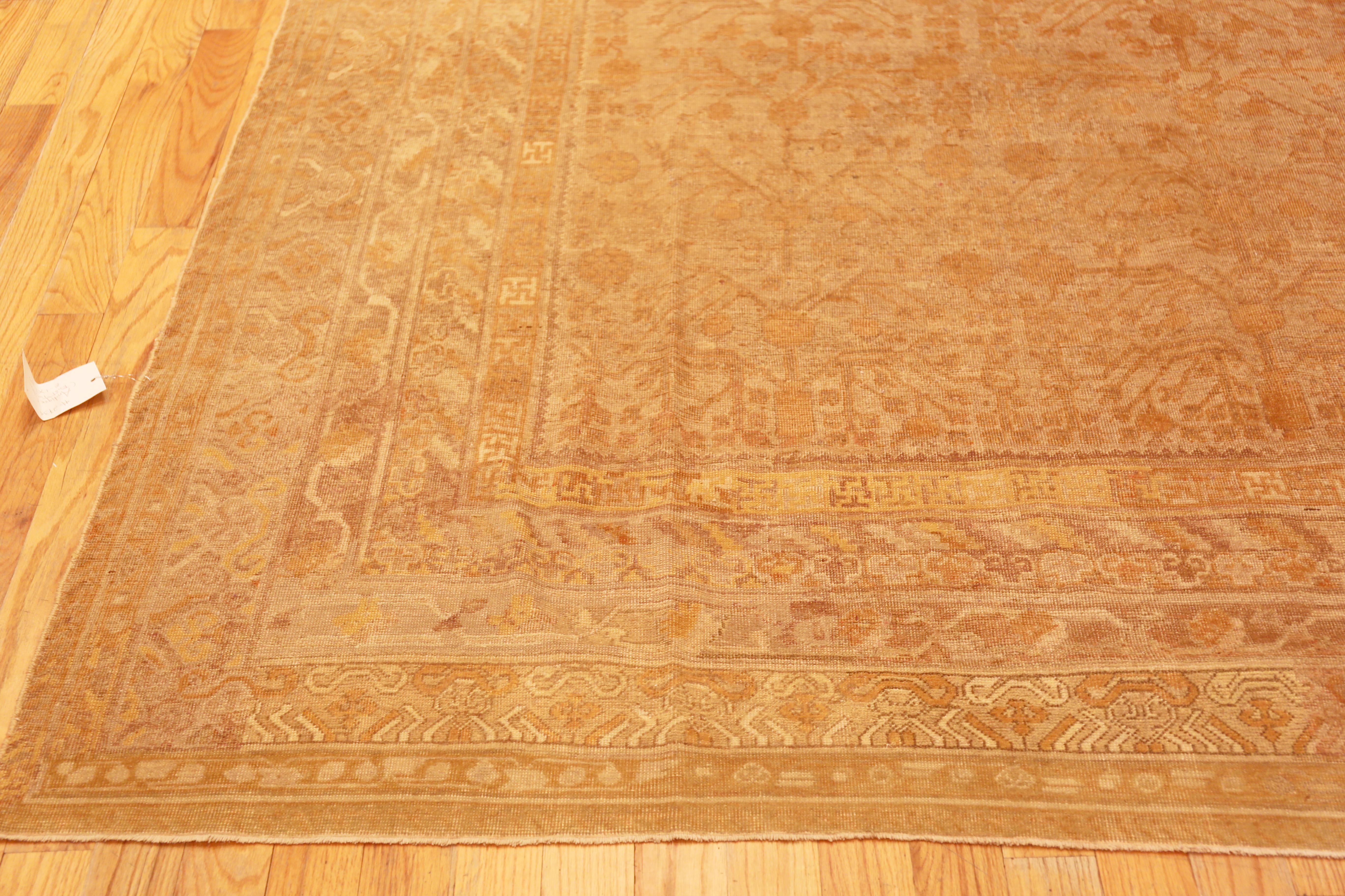 Hand-Knotted Long And Narrow Pomegranate Design Antique Khotan Rug 8'9
