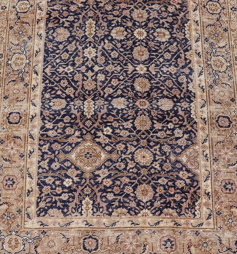 Long antique fine Turkish sivas runner with blue background and earthy tones.
Rug V21-0306-97, country of origin / type: Turkey / Sivas, circa 1920.
Measures: 2'9 x 15'9. 
Stylized all-over motifs are featured in a pattern on this antique Sivas