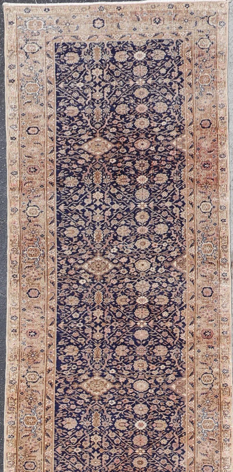 Hand-Knotted Long Antique Fine Turkish Sivas Runner with Blue Background and Earthy Tones For Sale