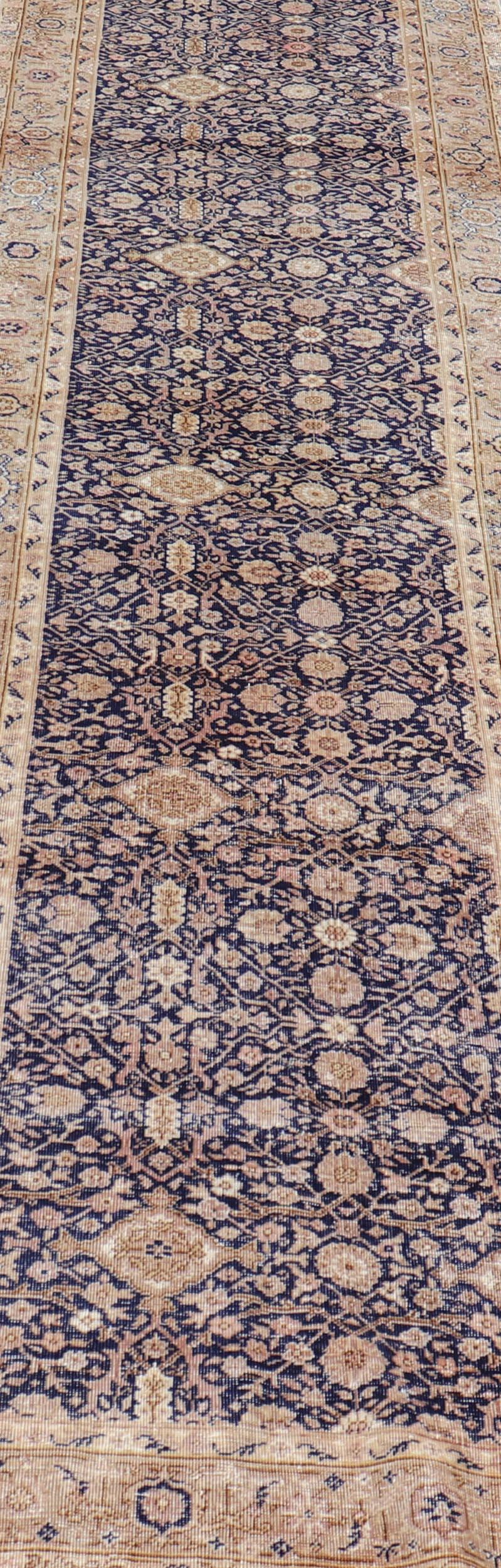 Wool Long Antique Fine Turkish Sivas Runner with Blue Background and Earthy Tones For Sale