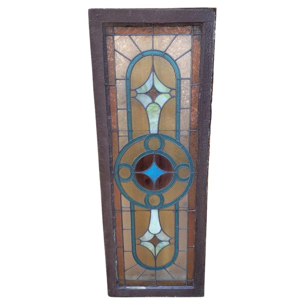 Long Antique Geometric-Patterned Stained Glass Window

This long rectangular stained glass window depicts an abstract star-like geometric pattern. This pane would be a beautiful accent piece for your living room or would bring soft natural light to