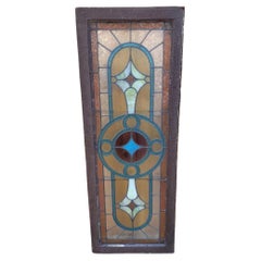 Long Antique Geometric-Patterned Stained Glass Window