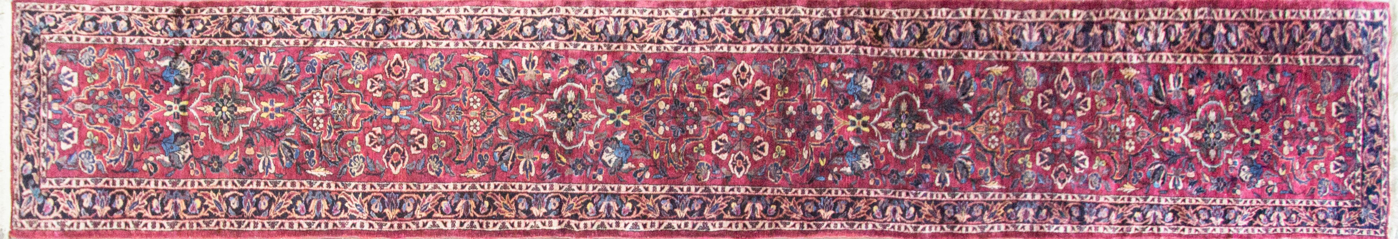 Immerse yourself in the timeless allure of our Antique Persian Lilihan runner, a true gem 2'8