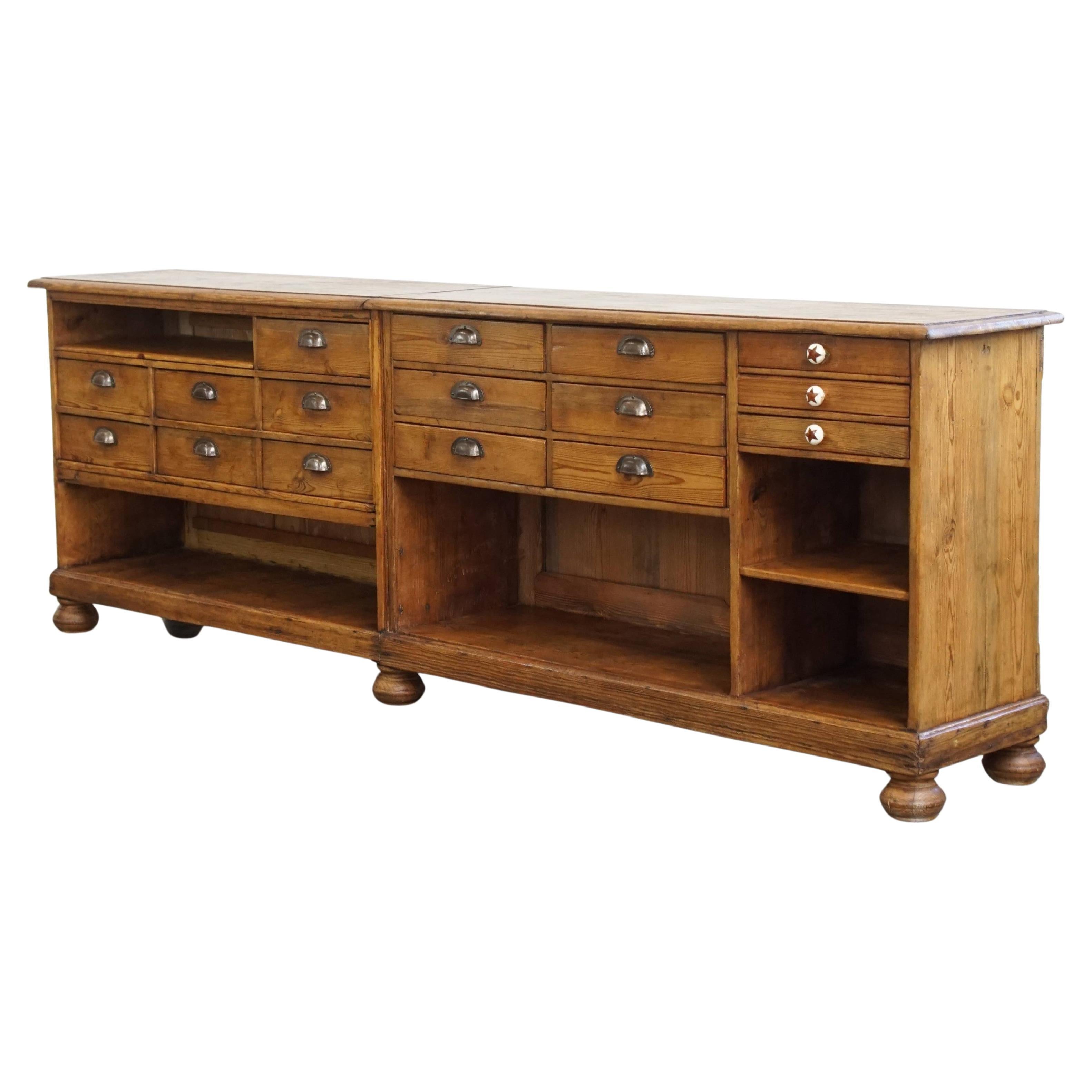 Long Antique Pine Wood Counter / Sideboard with 16 Drawers For Sale
