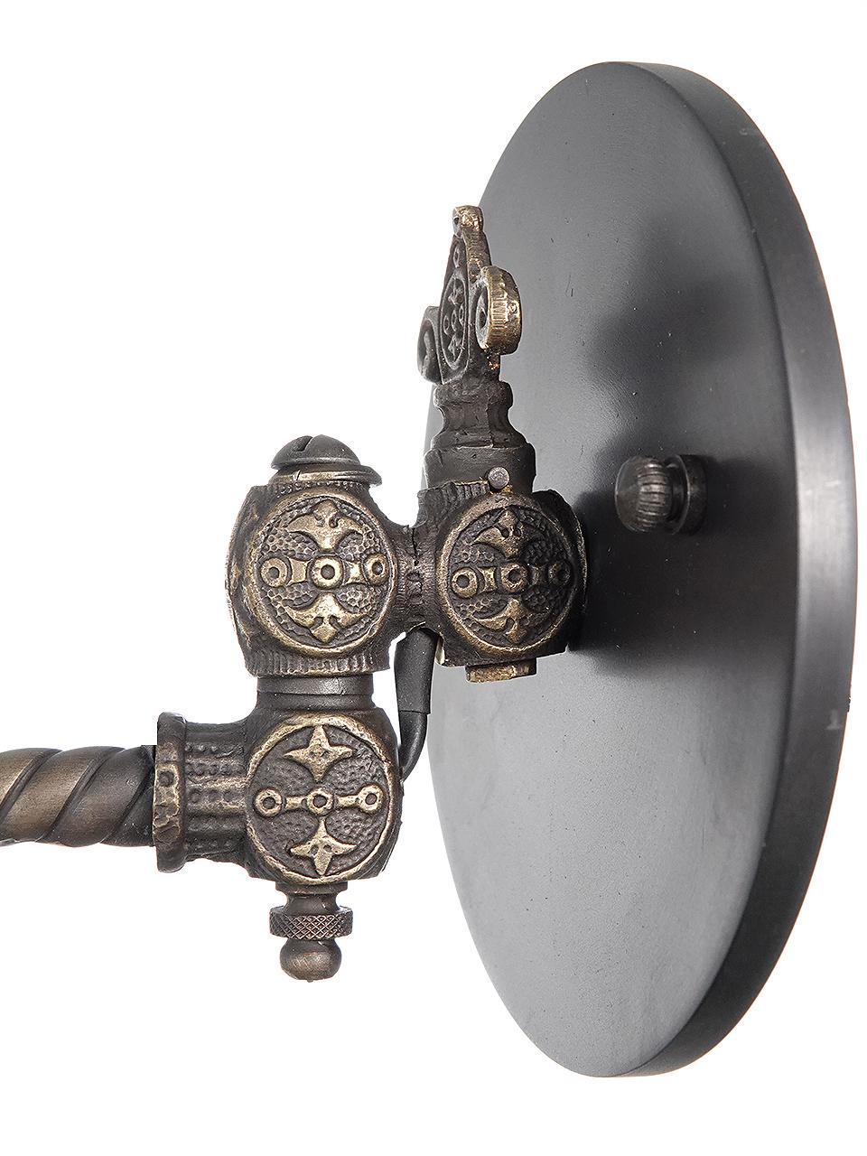 This is a nice delicate double arm gas articulating wall sconce. The brass castings have lots of ornate Victorian detail and it ends with a beautiful pleated milk glass shade. It is wired to now take a standard E12 bulb. One in stock.