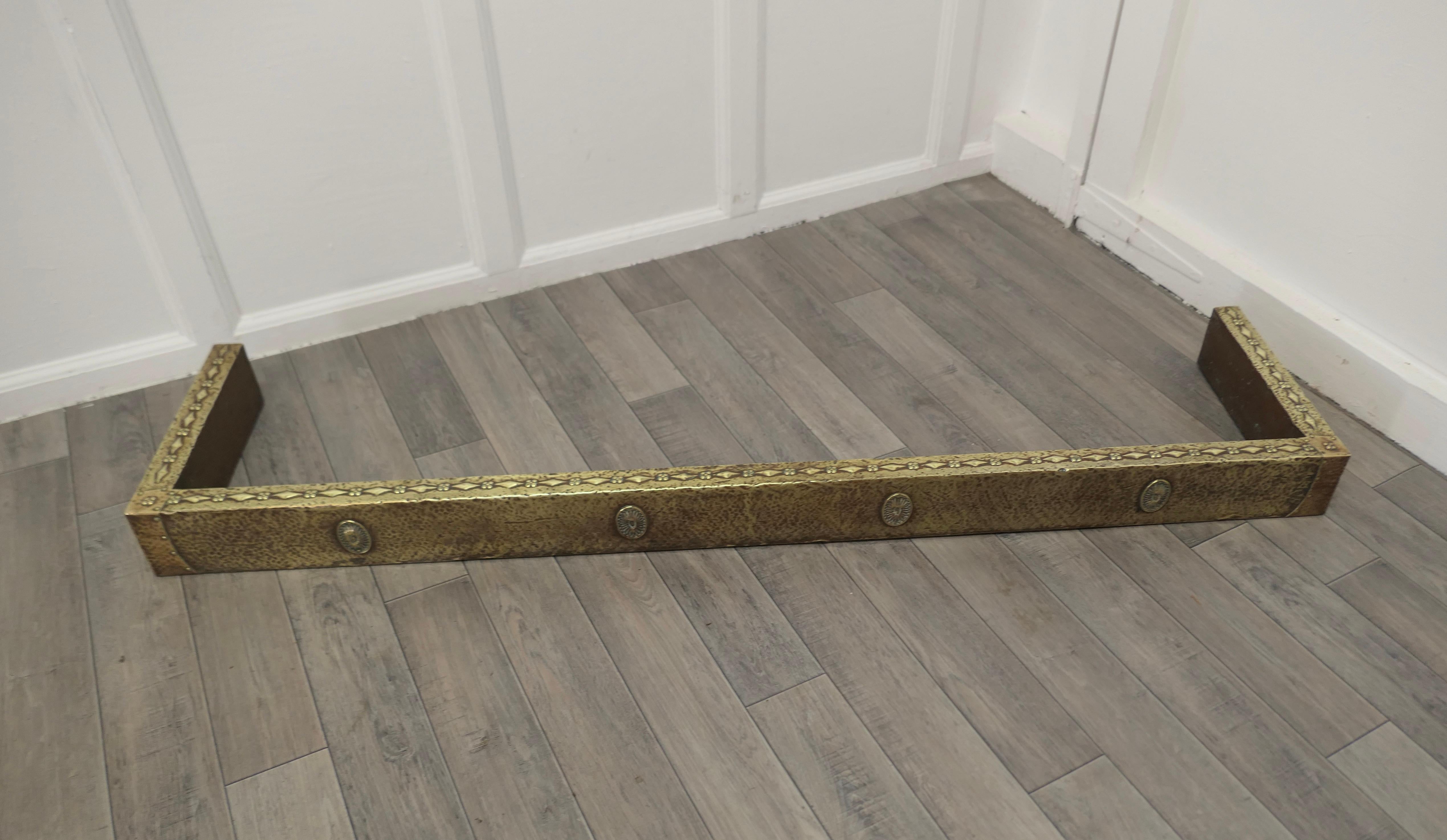 Long Arts and Crafts Beaten Brass Fender

 This is a good large Brass Fender it is worked in beaten brass and with a slightly brutalist look to the finish
The Fender is in good condition it is 4” high, and 57” long and 14” deep 
GF30.
 