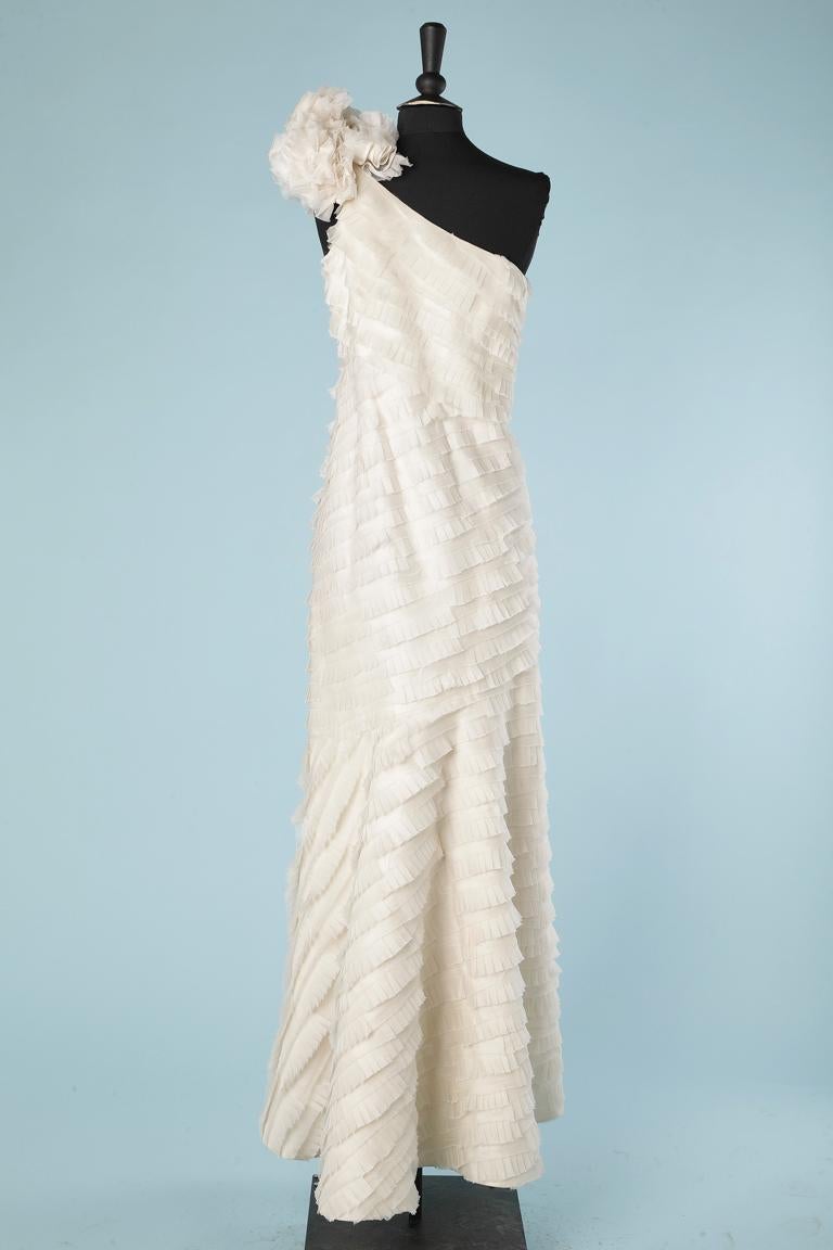 Long Asymmetrical Ruffles Long asymmetrical evening dress made of ribbon's ruffles Rolando ...