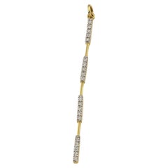 Pendentif bar long en or jaune et diamants