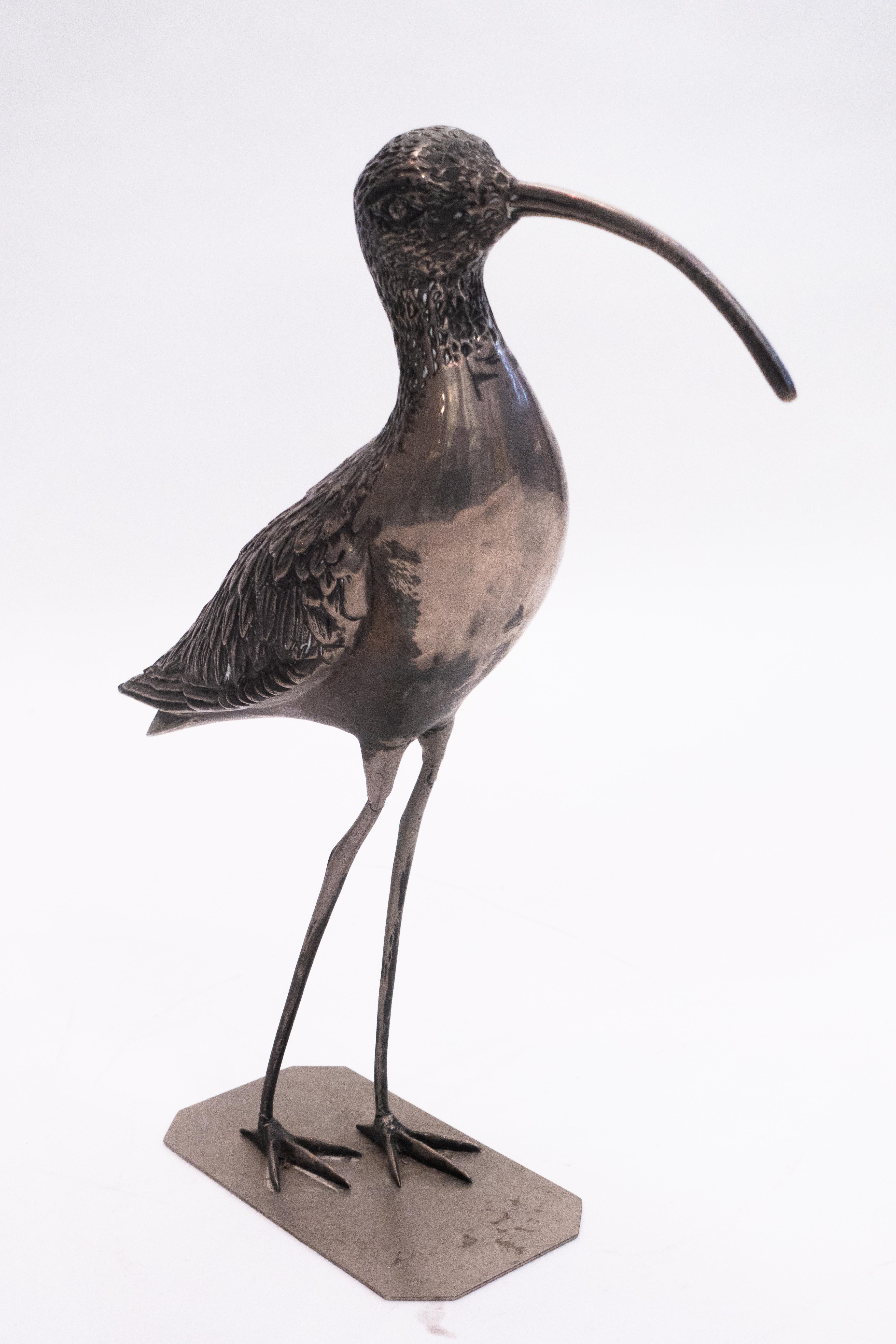 Mid-Century Modern realistic representation of a long-billed curlew created in white metal.