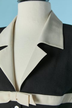 Long black and off-white single breasted jacket and bow SUITE by CHANTAL THOMASS
