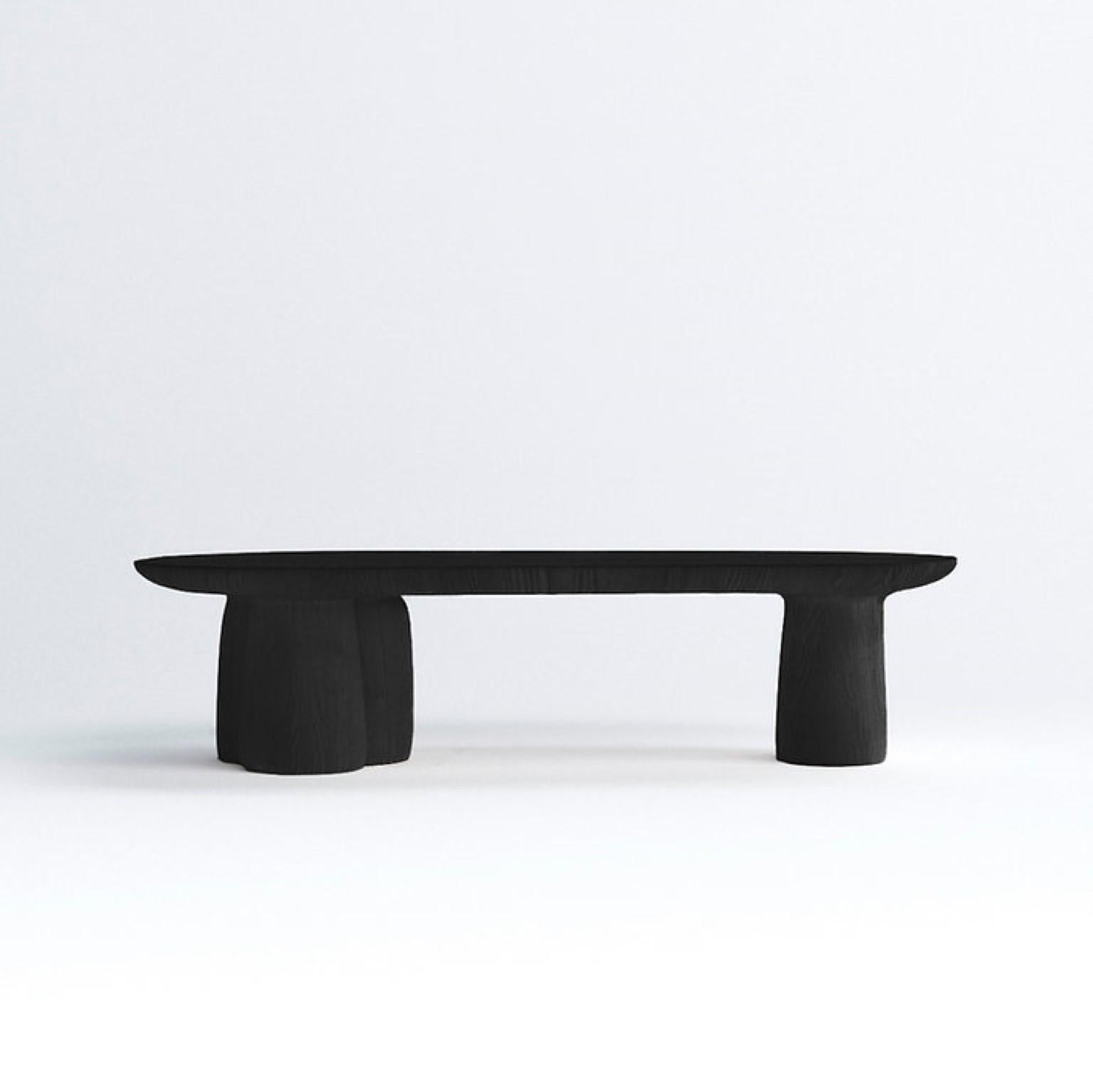 Long black coffee table by Faina
Design: Victoriya Yakusha
Materials: Ash in natural or black color
Dimensions: W 113 x D 47 x H 29 cm

Like strong sunflower stems, SONIAH tables are fed with energy from the ground, saturating with it the space
