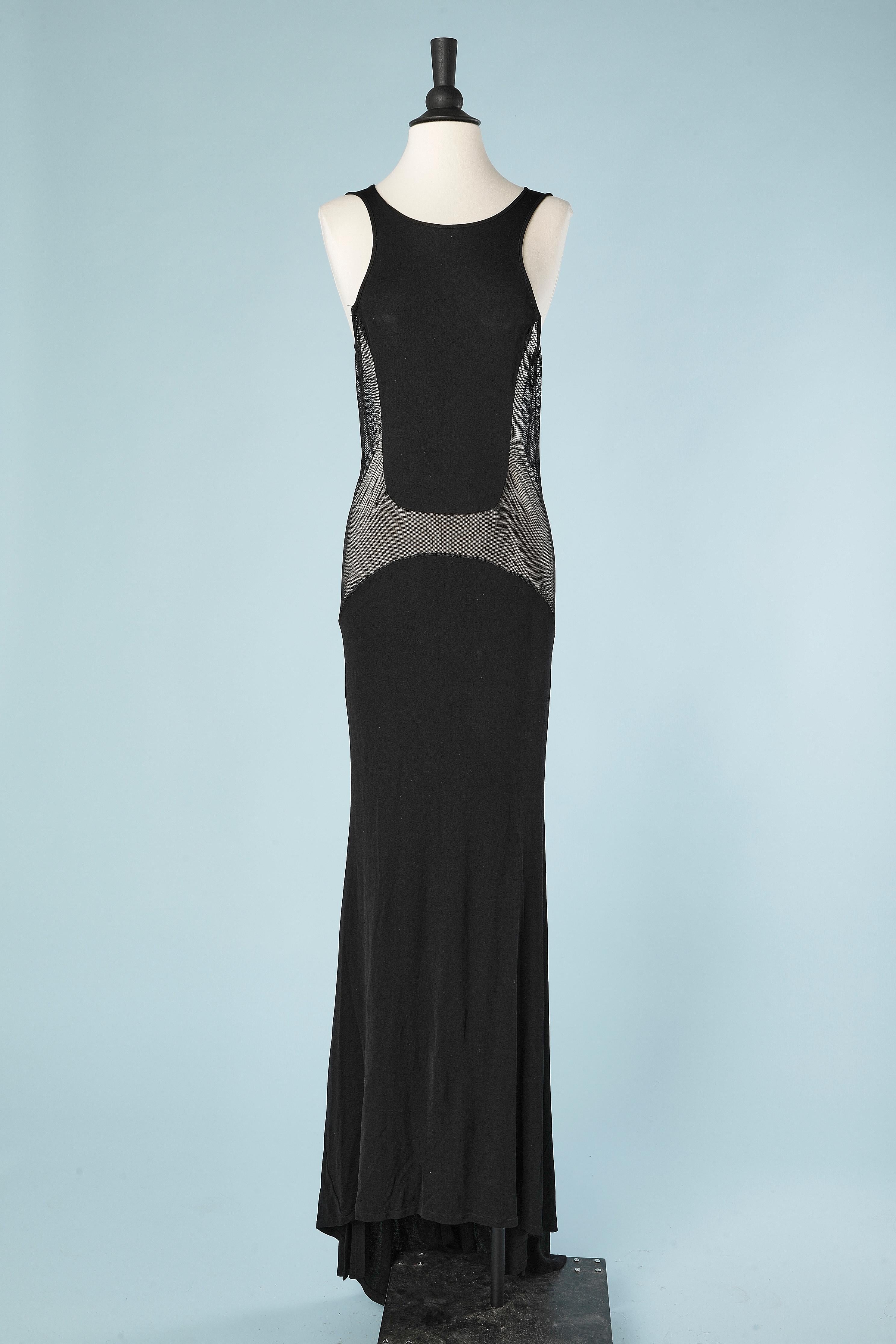 Long black evening drag dress with jersey and see-through resille. Attach on the bottom edge to hold the drag. Hook&eye in the middle back. Fabric composition: rayon, polyamide, elastane 
SIZE M