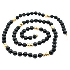 Lange schwarze Onyxstrang-Halskette 28" Halskette 14k Gelbgold Perlen Stationen & Verschluss