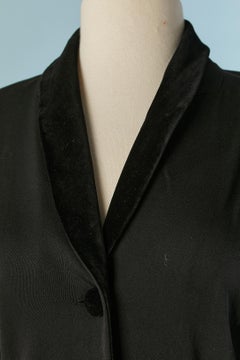 Long black wool coat with velvet sleeve, collar and pocket flap CHANTAL THOMASS