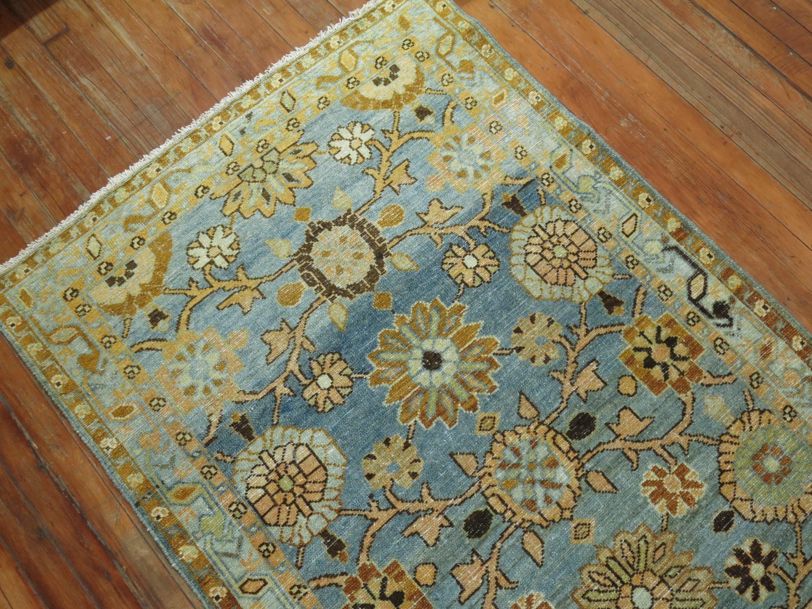 An antique malayer runner with a mini khani pattern on an sky blue/aqua blue background from the early 20th century

Size: 3'2