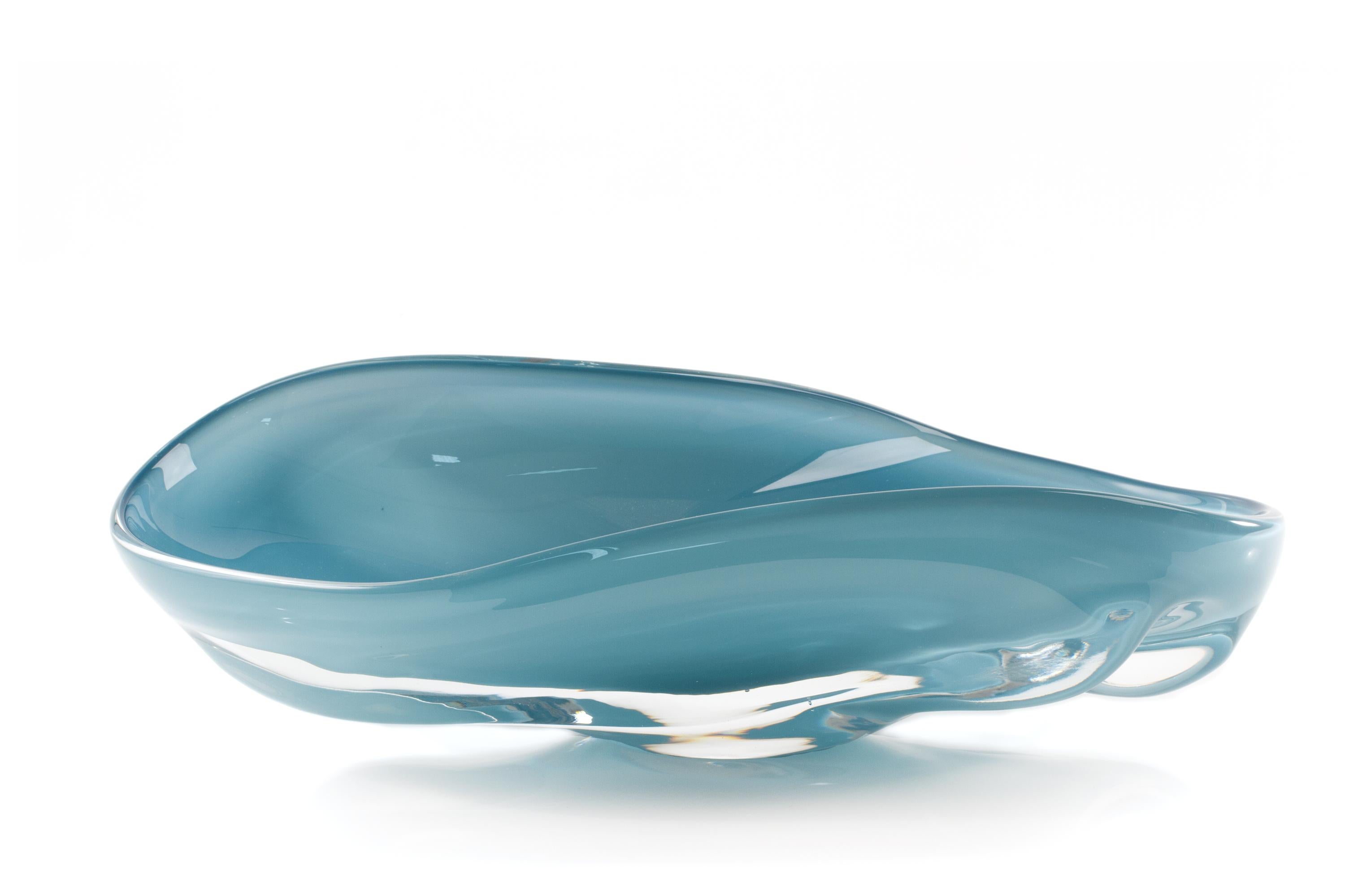Long Blue Sway Bowl by SkLO
Dimensions: D 51 x W 23 x H 13 cm
Materials: glass
Available in high (25x14cm) and long (51x23x13cm). Available in blue, gray, lagoon, olivin, pink and white.

Asymmetrical organic bowls with amazing depth of color