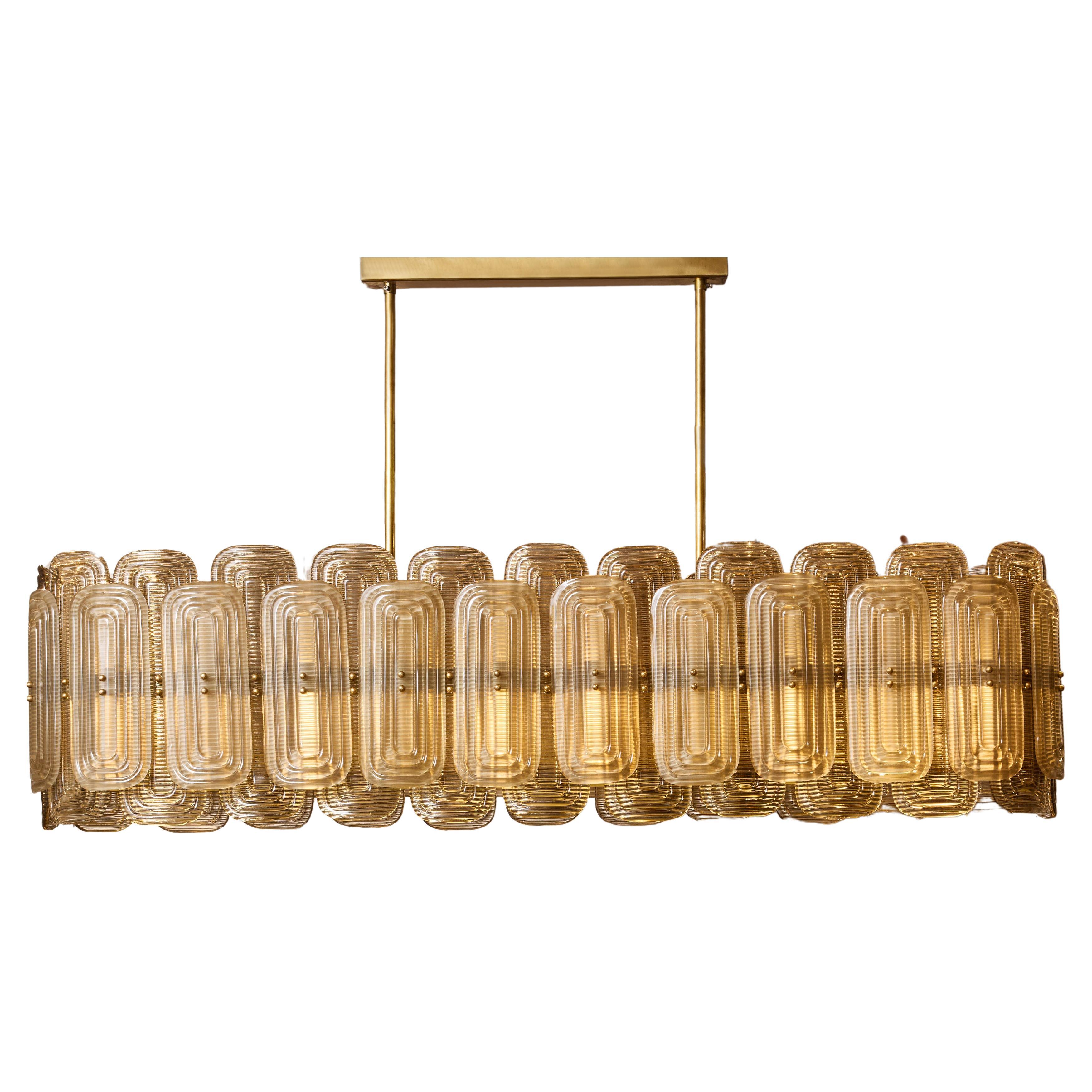 Long brass chandelier in Murano glass by Studio Glustin For Sale