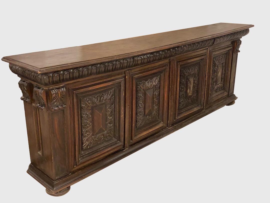 A circa 1920s Italian carved wood console with interior shelves.

Measurements:
Height 37