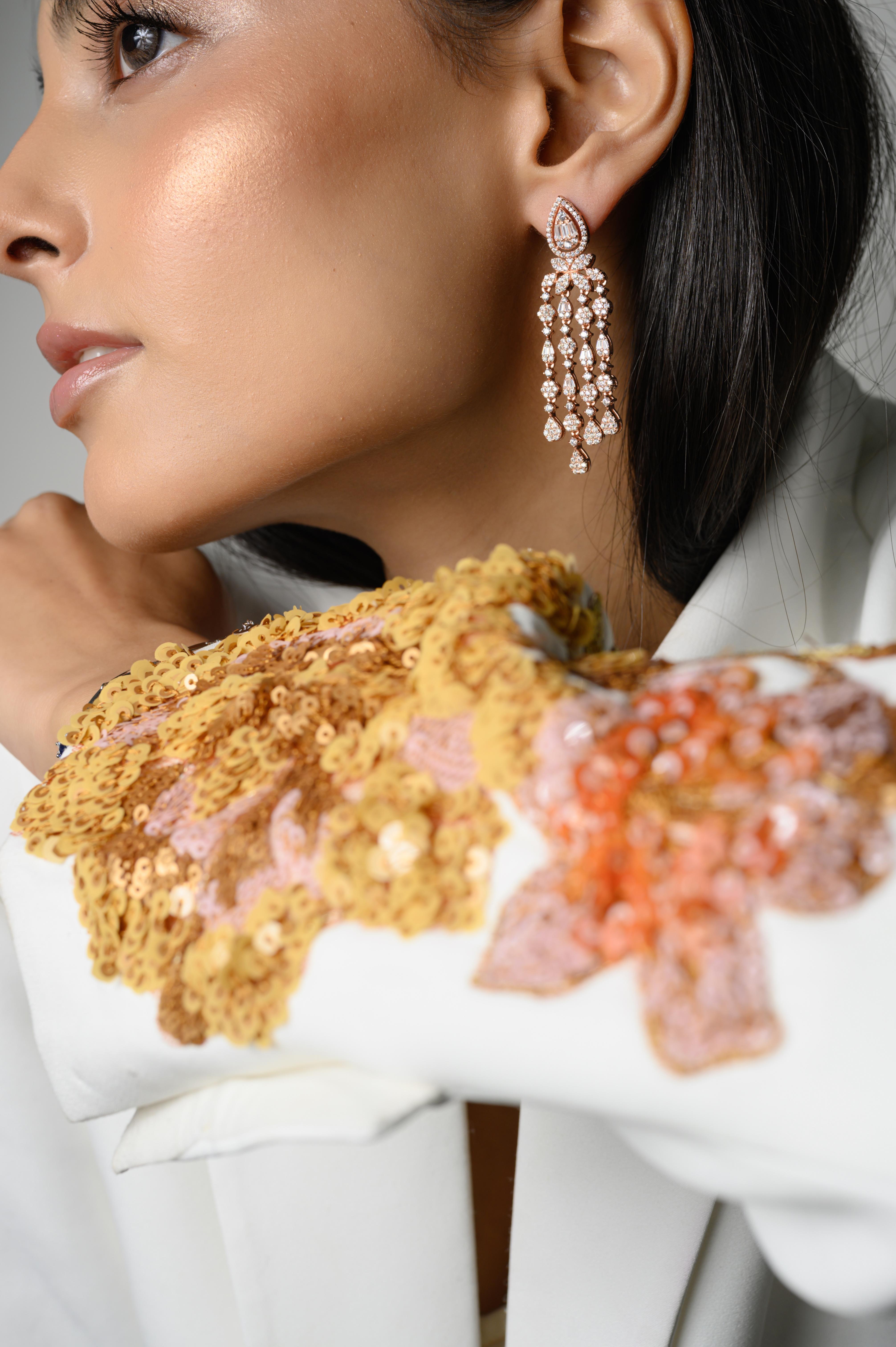Long Chandelier Zirconia Wedding Earrings in sterling silver. You shall need these statement chandelire earrings to make a statement with your look. Each piece features dazzling cubic zirconia stones, renowned for their brilliance and clarity, set