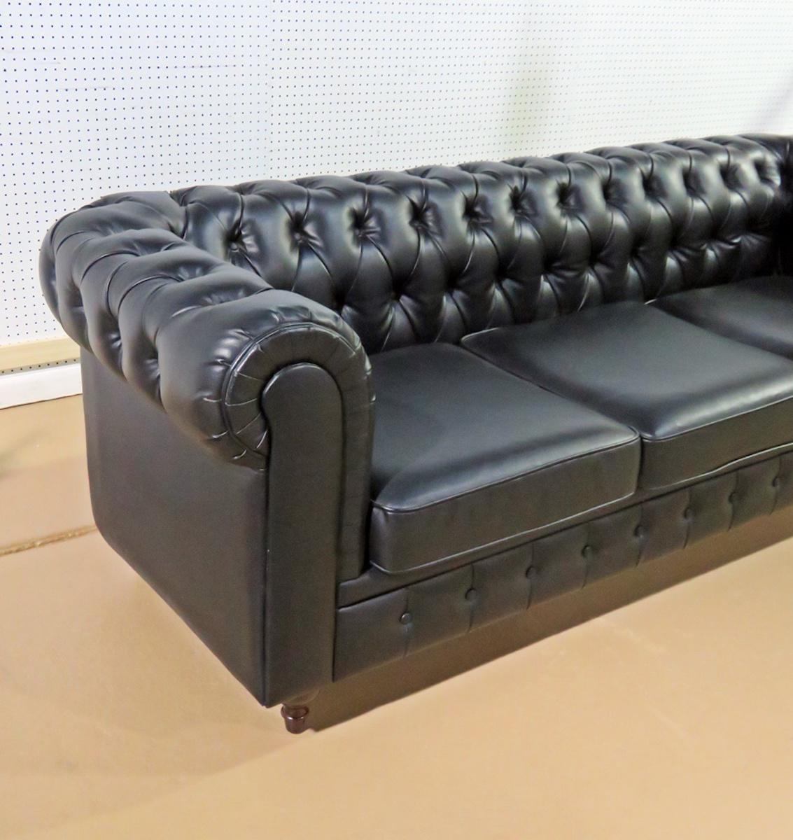 Beautiful tufted sofa with turned wood legs. Three cushion sofa with tufting on back and arms.
(Please confirm item location - NY or NJ - with dealer).
 