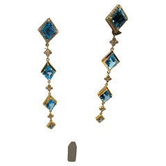 Pendientes largos de cóctel Topacio azul y diamantes Oro de 18 quilates