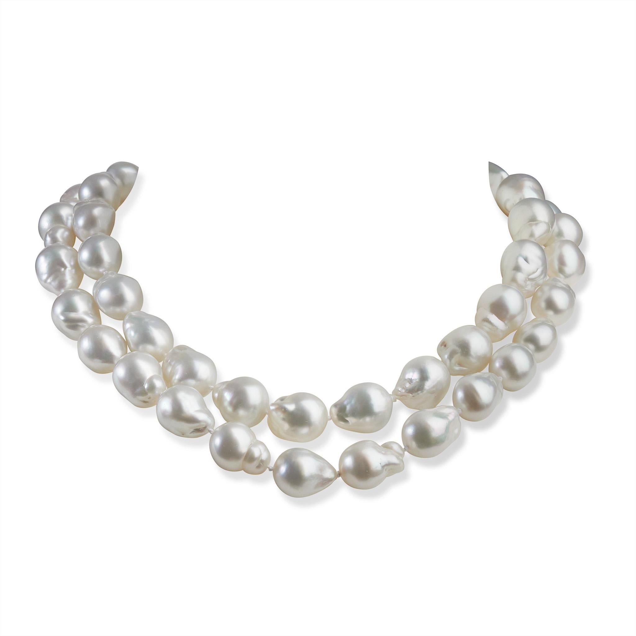 This contemporary necklace is composed of 49 cultured white natural color south sea baroque pearls measuring approximately 16.00 x 13.00mm. The strand of white pearls with silvery-rose tones is completed by a baroque pearl shaped 18K white gold