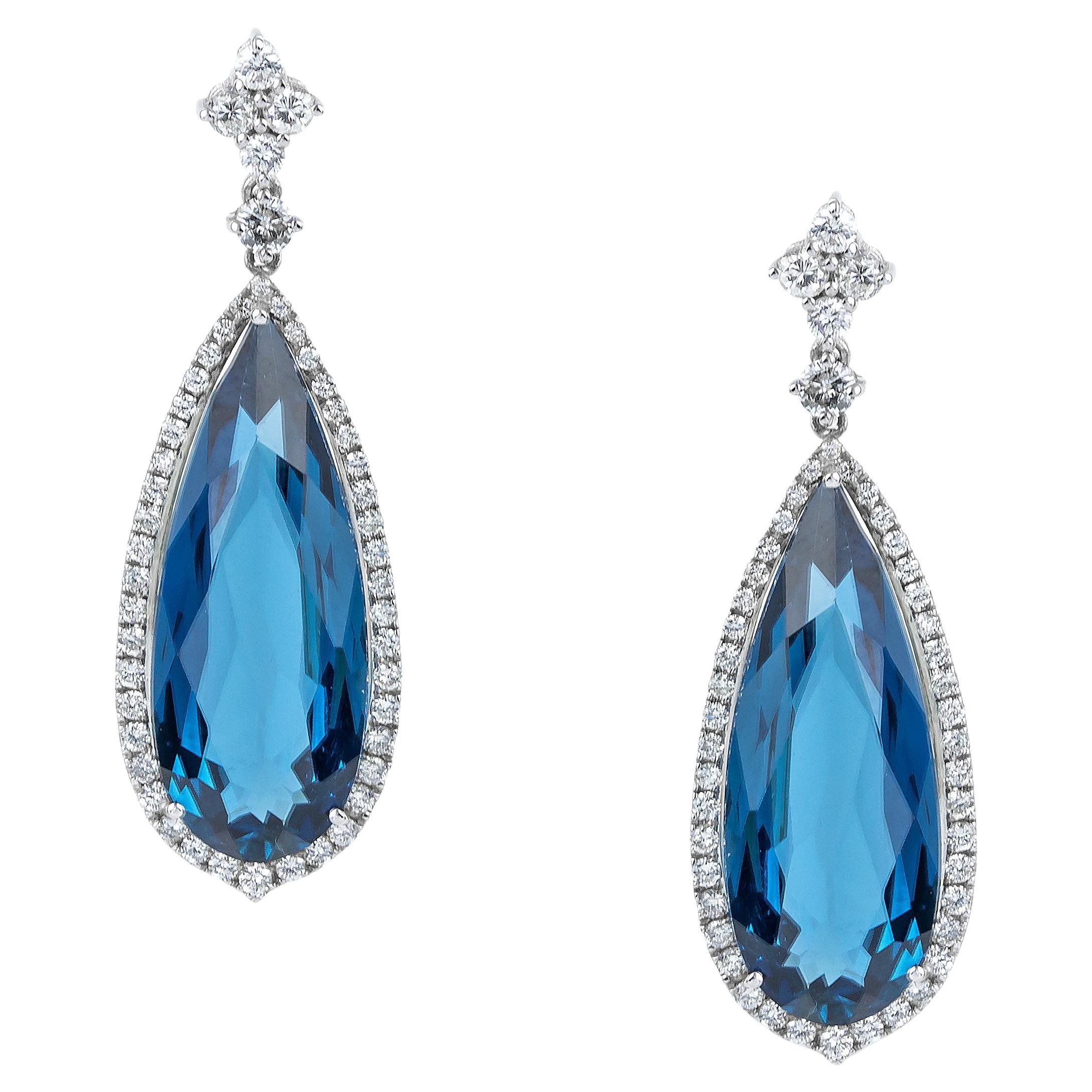 Long Dangle Earrings Pear shape with London Blue Topaz and Diamonds in 18kt Gold For Sale