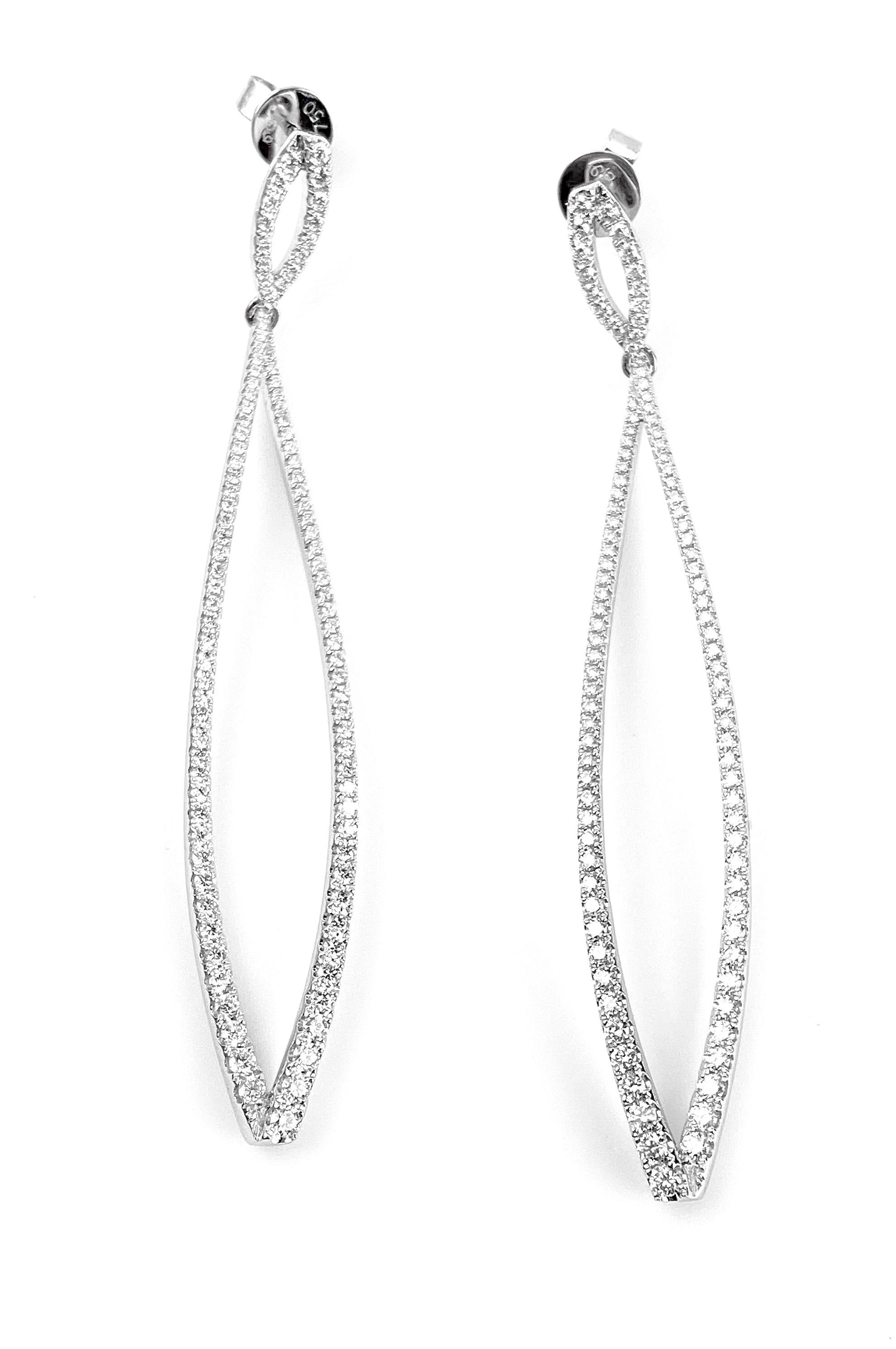 Long dangling marquise-shape earrings in 18kt white gold, with 206 diamonds for a total of 0.82ct total. Held with heavy backings.