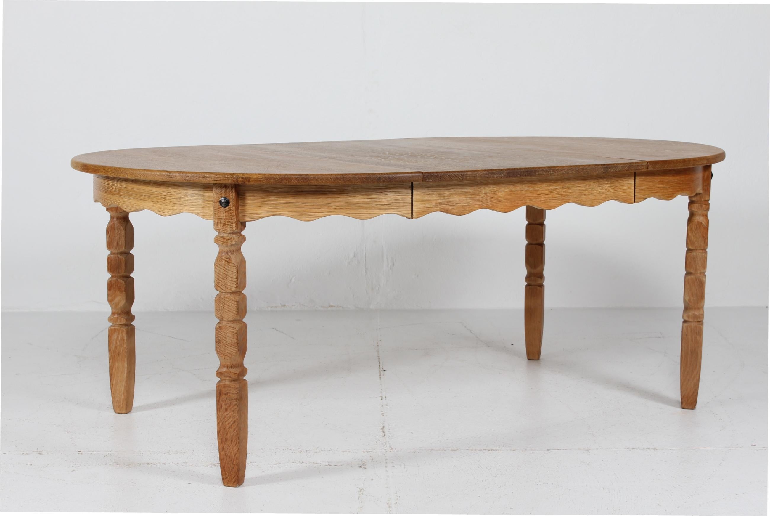 Long Danish 3 Leaves Extendable Dining Table of oak by Henning Kjærnulf 1970s 3