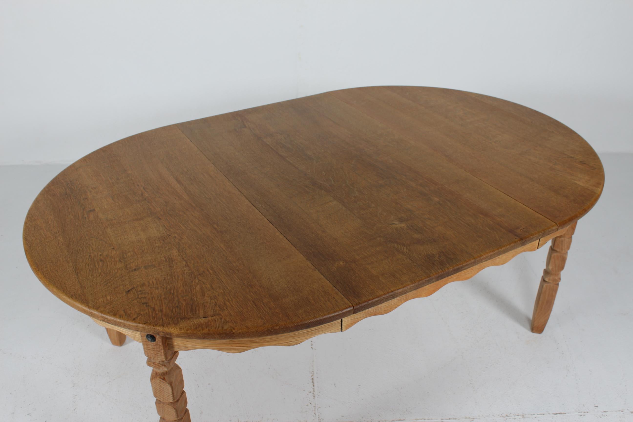 Long Danish 3 Leaves Extendable Dining Table of oak by Henning Kjærnulf 1970s 4