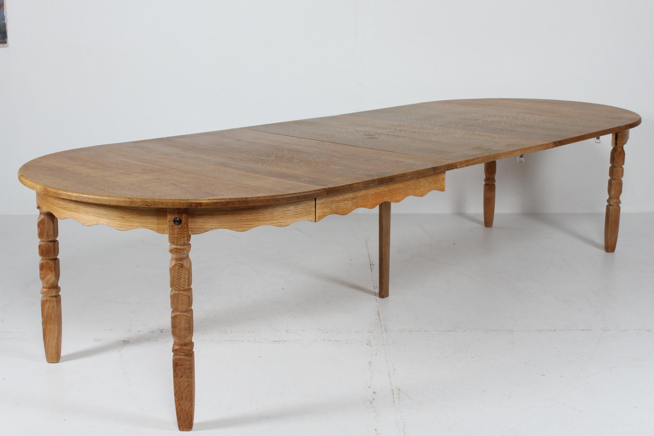 Long Danish 3 Leaves Extendable Dining Table of oak by Henning Kjærnulf 1970s 6