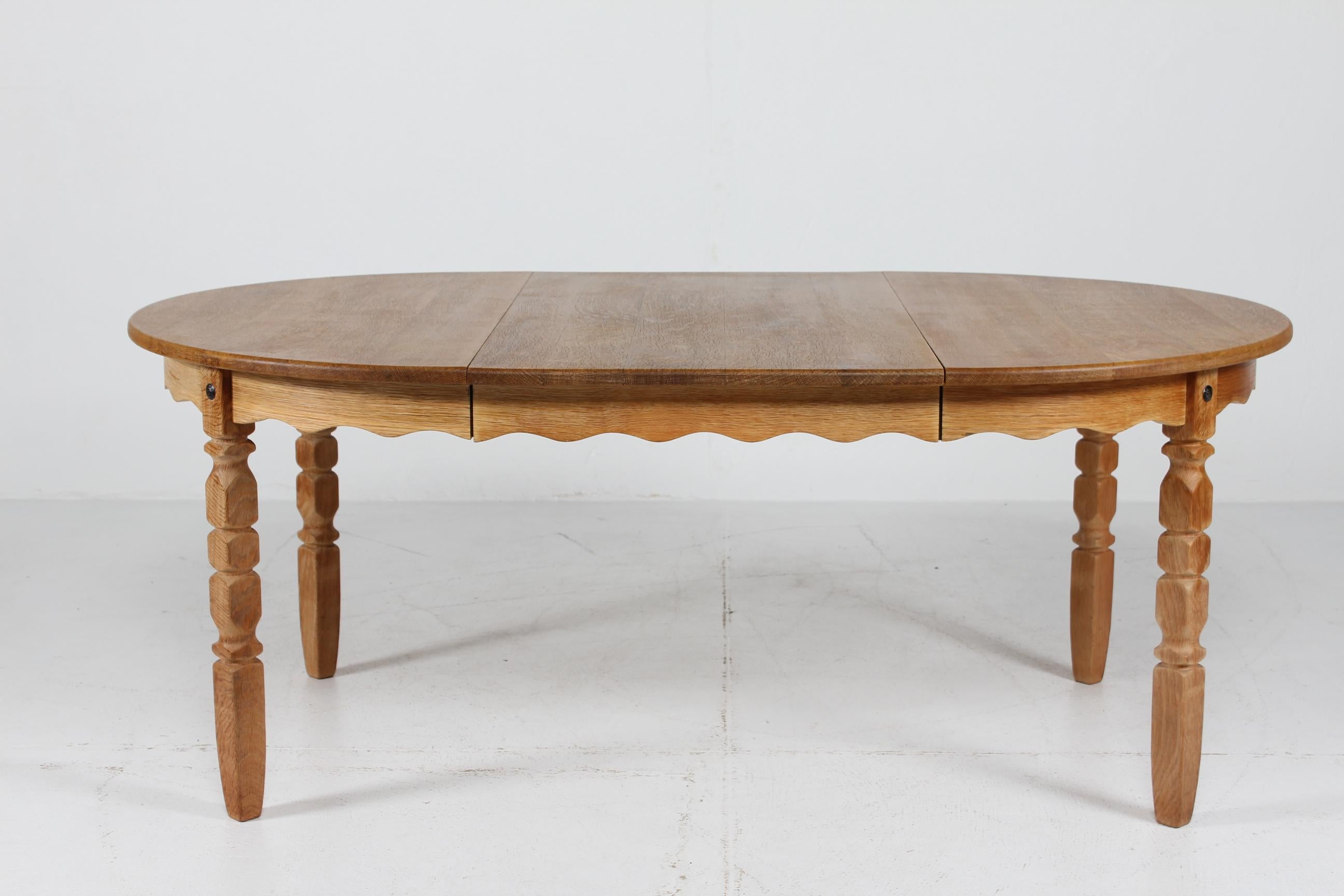 Late 20th Century Long Danish 3 Leaves Extendable Dining Table of oak by Henning Kjærnulf 1970s