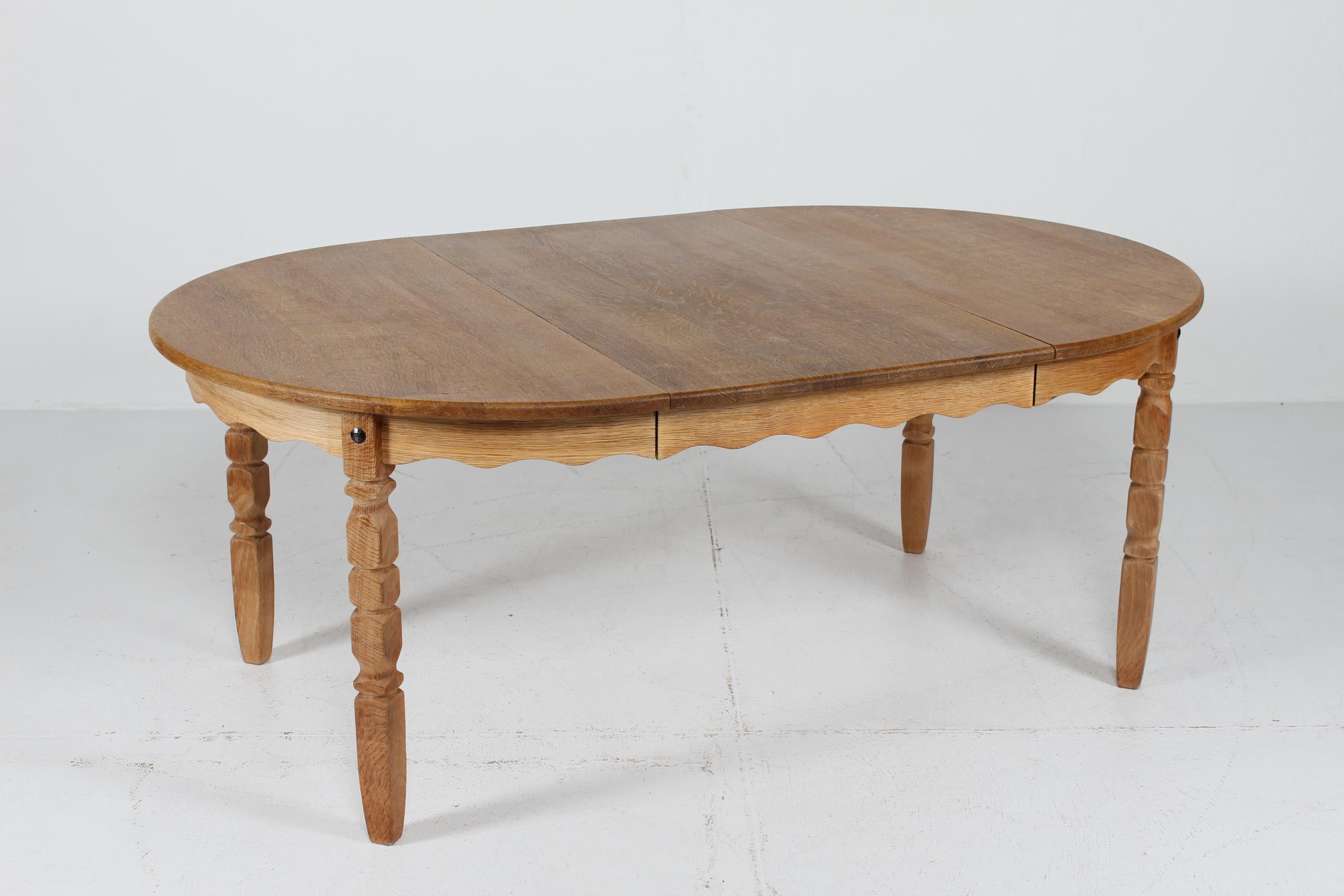 Long Danish 3 Leaves Extendable Dining Table of oak by Henning Kjærnulf 1970s 2