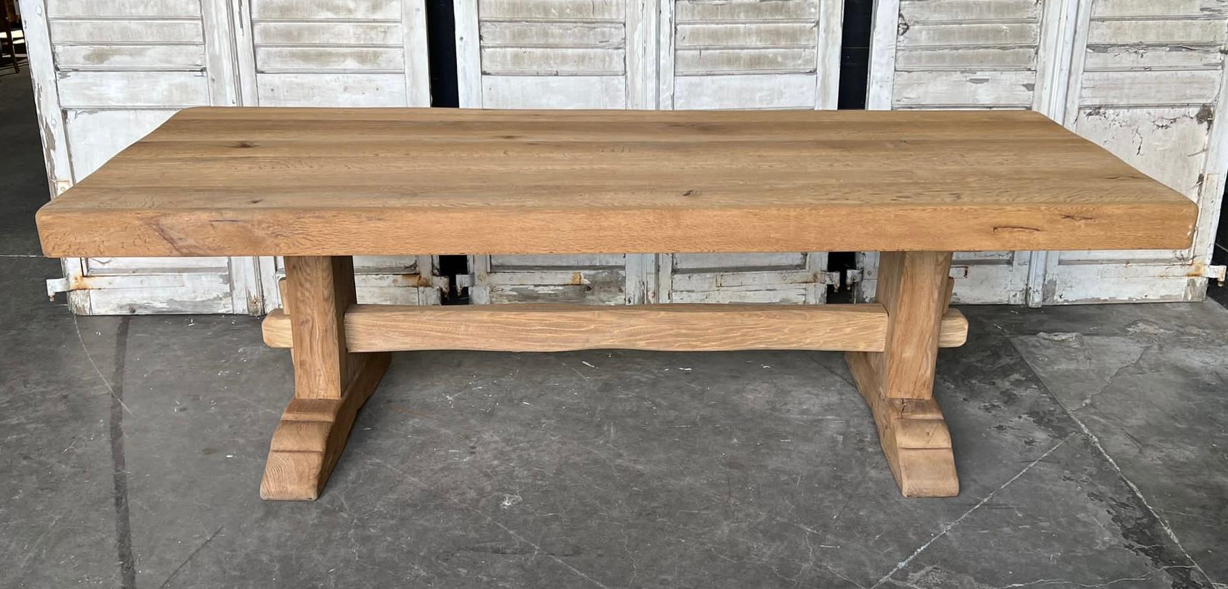 A very good quality French Farmhouse Dining Table which is unusually deep at 90cm. Made from solid Oak which we have bleached for a lighter look and dating to the early 1900s this table of of good quality construction and will be around for