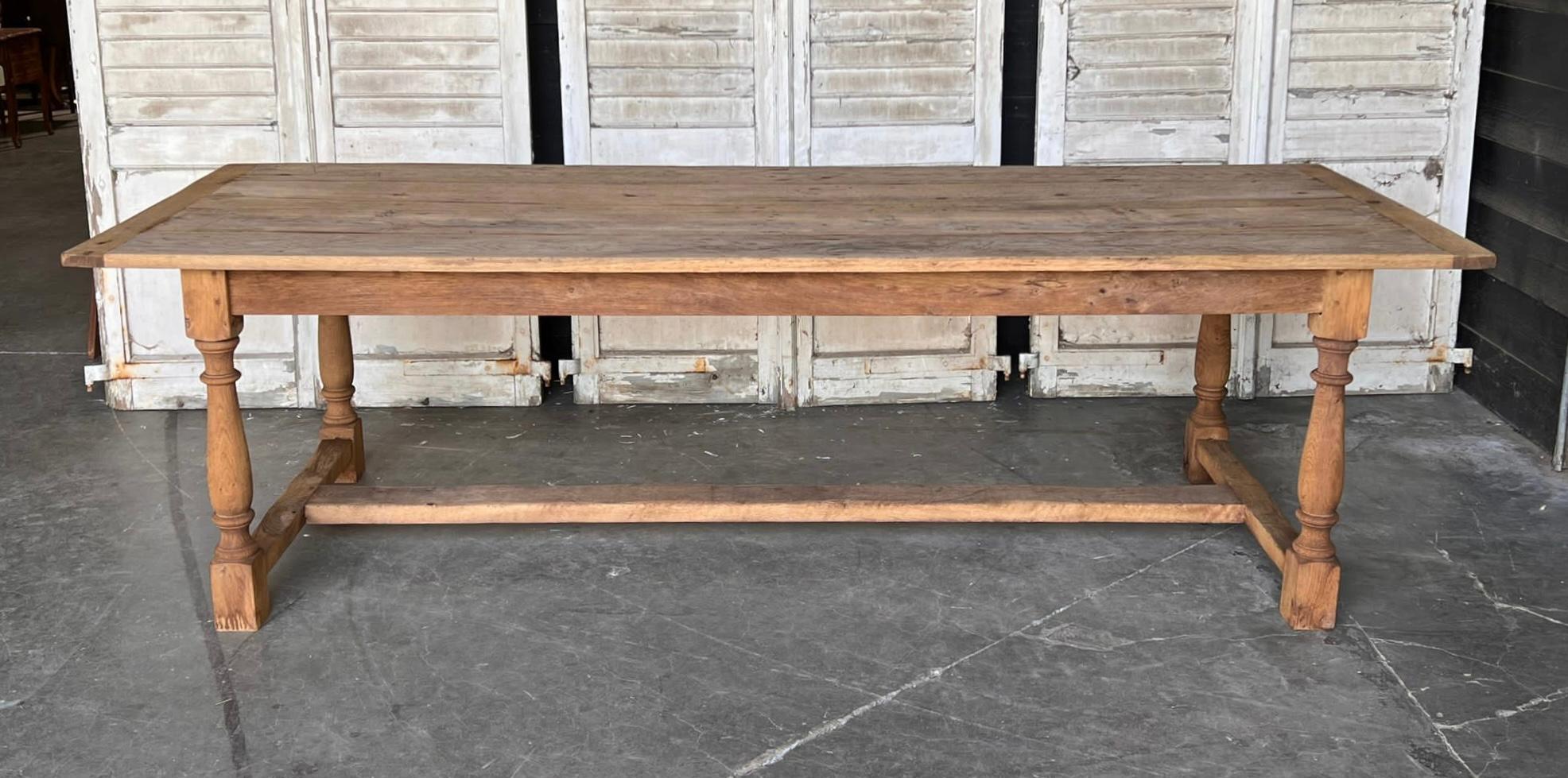 A very rare find this table being 260 long and 95 deep, they are never this deep. French in origin and dating to the early 1900s, of very good quality pegged construction. Made from solid Oak which we have bleached for a lighter look and to bring