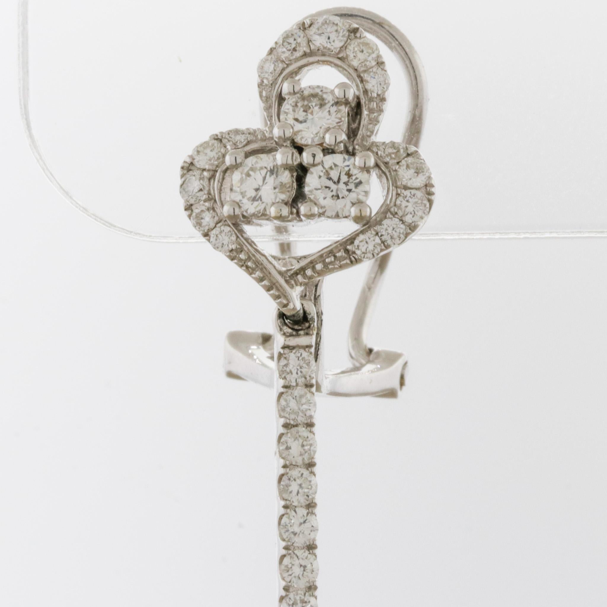 Uomo Orecchini pendenti in oro con diamante lungo a spirale in vendita