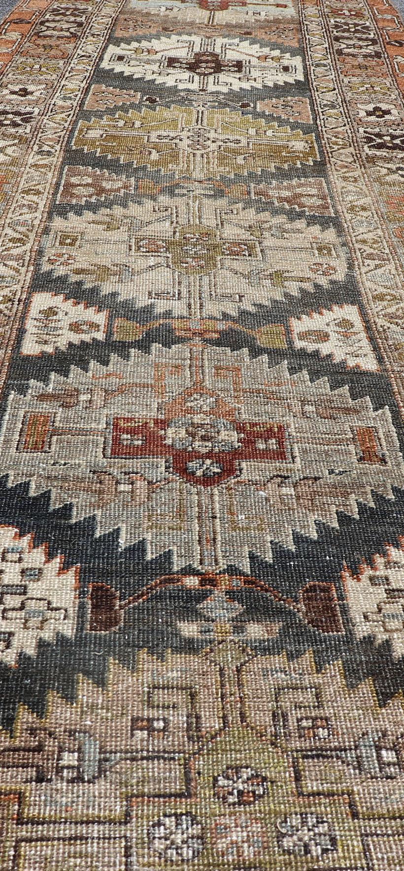 Long Distressed Persian Heriz-Serapi Runner with Multi Medallions For Sale 1
