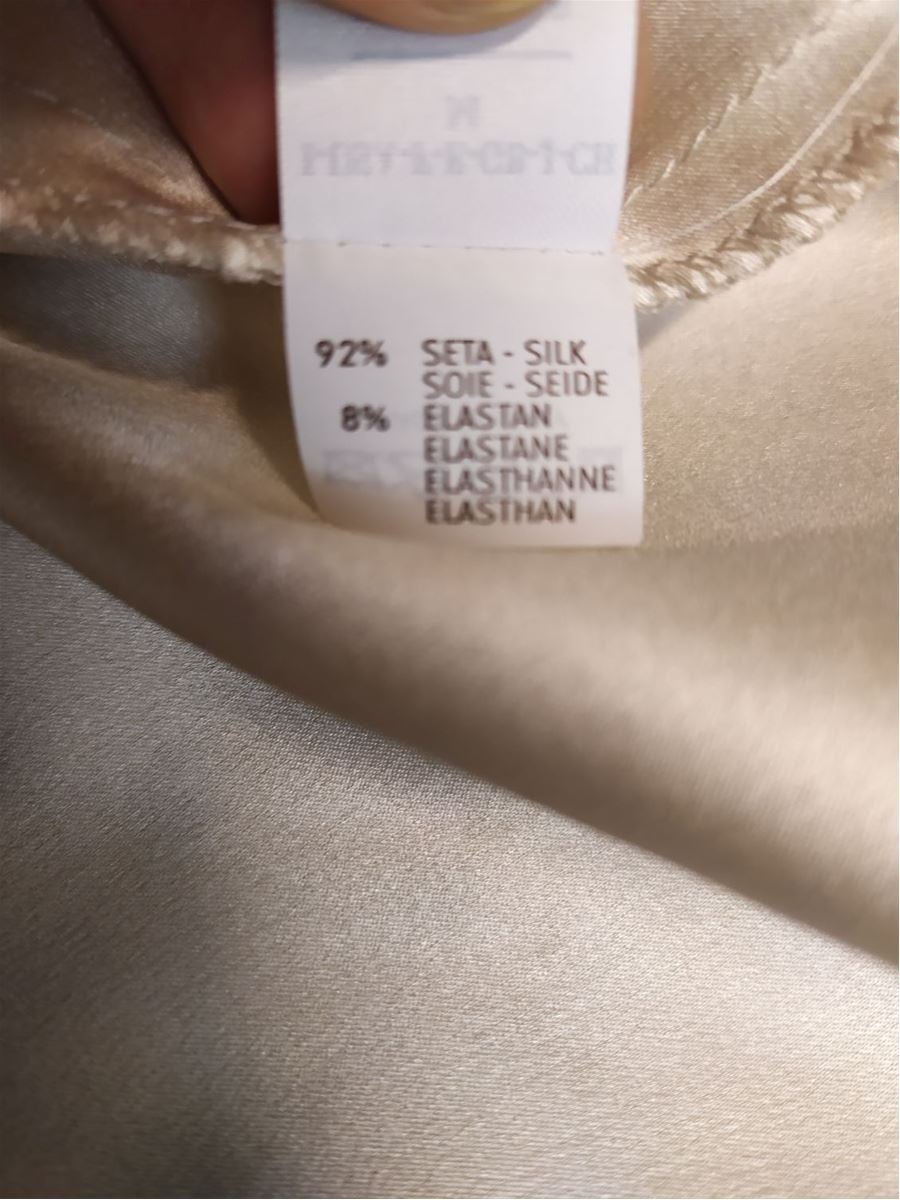 Silk (92%) Elasthane (8%) Cream white color Side v-neck Maximum length cm 151 (5944 inches)
