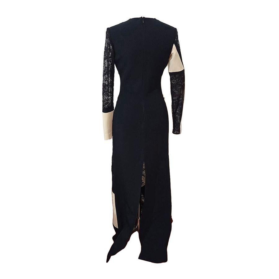 Acetate and viscose Black and white Amazing black lace Golden metal shells Long sleeves Maximum length cm 156 (614 inches) Shoulder cm 37 (145 inches)
