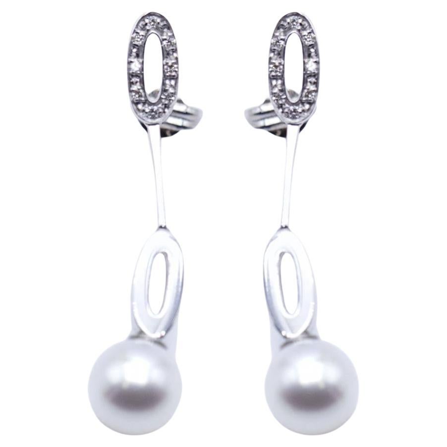 Long earrings in white gold and pearls For Sale