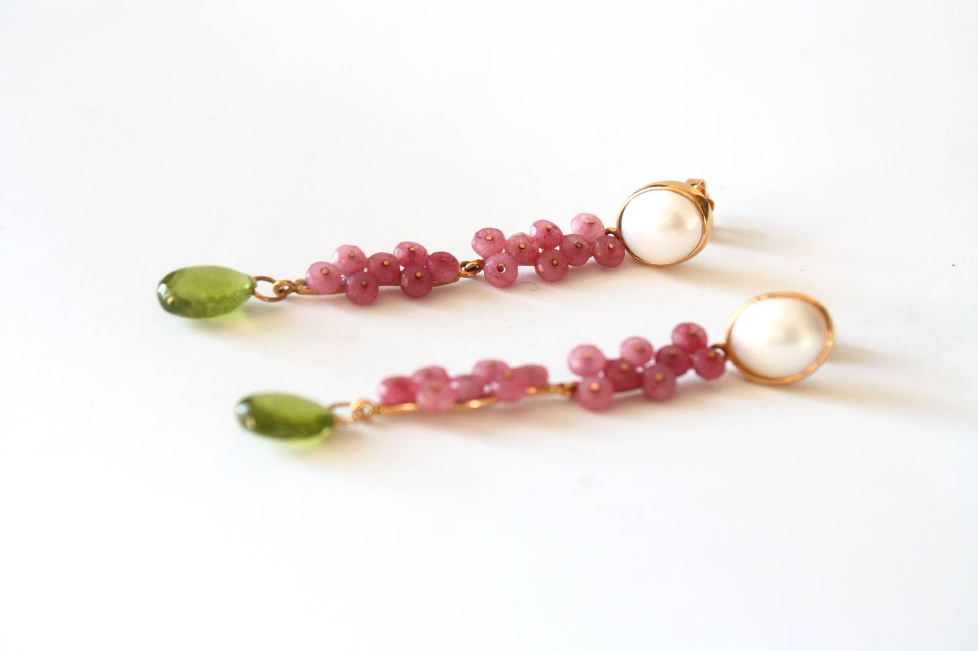  Long earrings with faced peridot drop rubellite stone and pearl cabochon, weight 6,0 long 7cm.
All Giulia Colussi jewelry is new and has never been previously owned or worn. Each item will arrive at your door beautifully gift wrapped in our boxes,