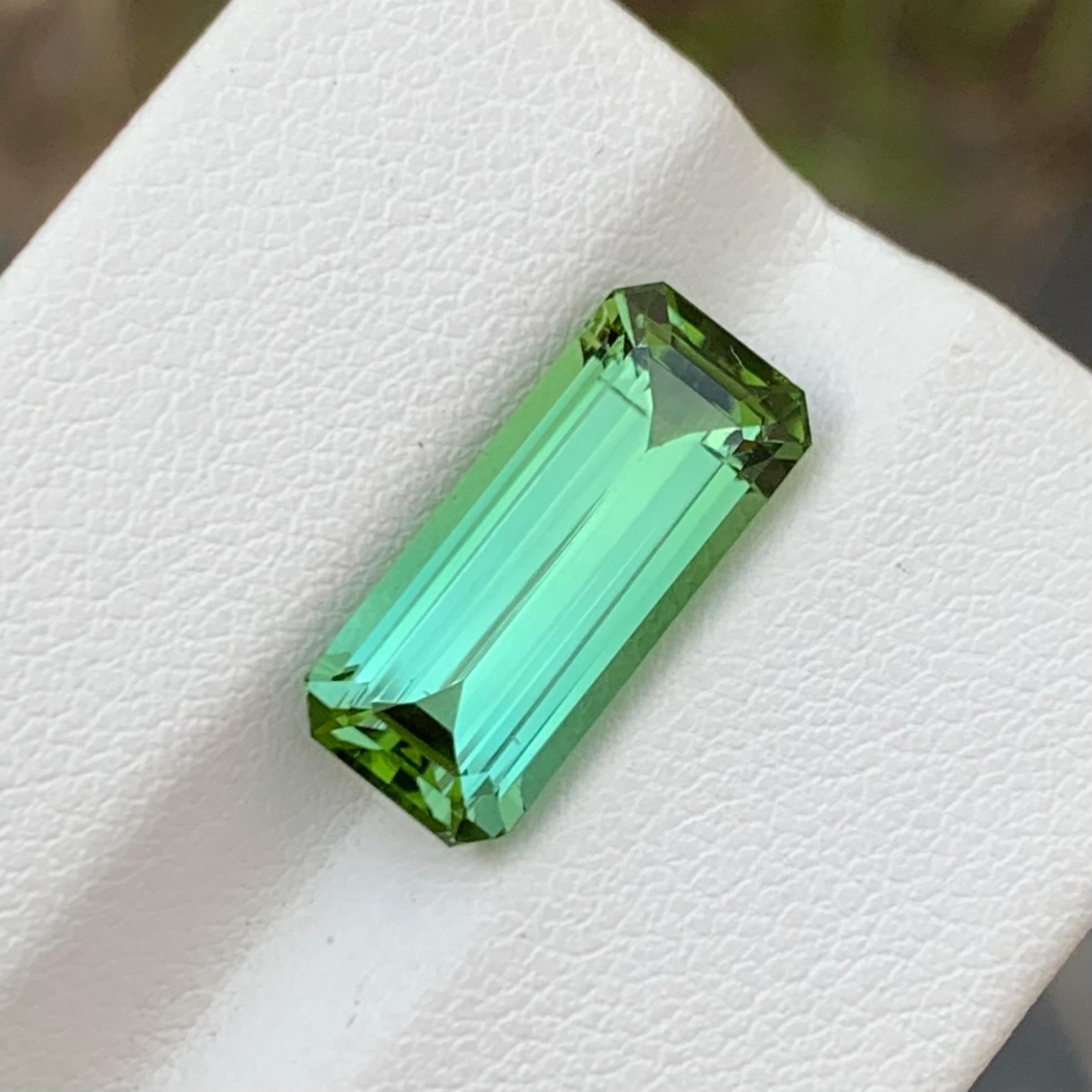 Loose Tourmaline 
Weight: 5.95 Carats 
Dimension: 15.5 x 6.9 x 6 Mm 
Colour: Mint Green 
Shape: Long Emerald 
Treatment: None
Certificate: On Demand 

Mint green tourmaline, a variety of the mineral tourmaline, captivates with its refreshing and