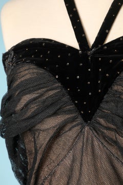 Long evening bustier dress in tulle with velvet appliqué Circa 1930