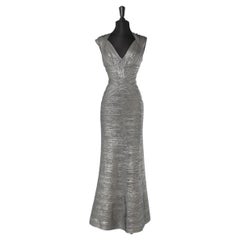 Long evening dress in coated silver knit stretch band Hervé Léger 